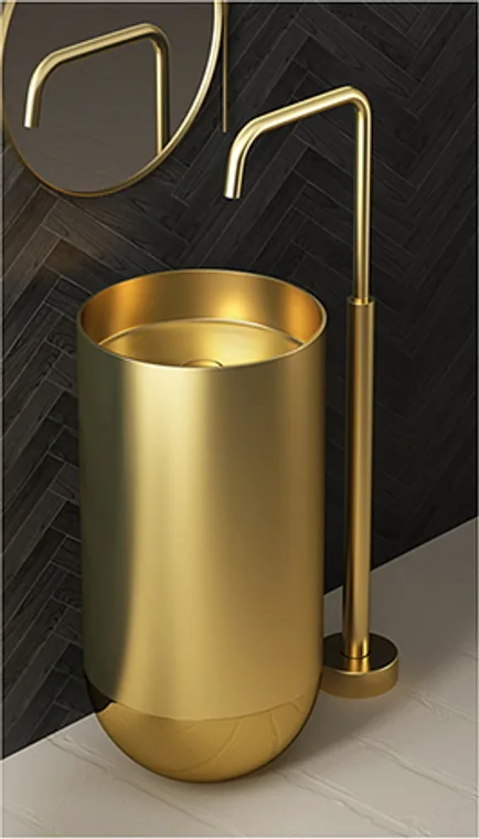 A freestanding stainless steel pedestal basin with a rounded tumbler-inspired base and a gold finish for high-end bathroom projects.